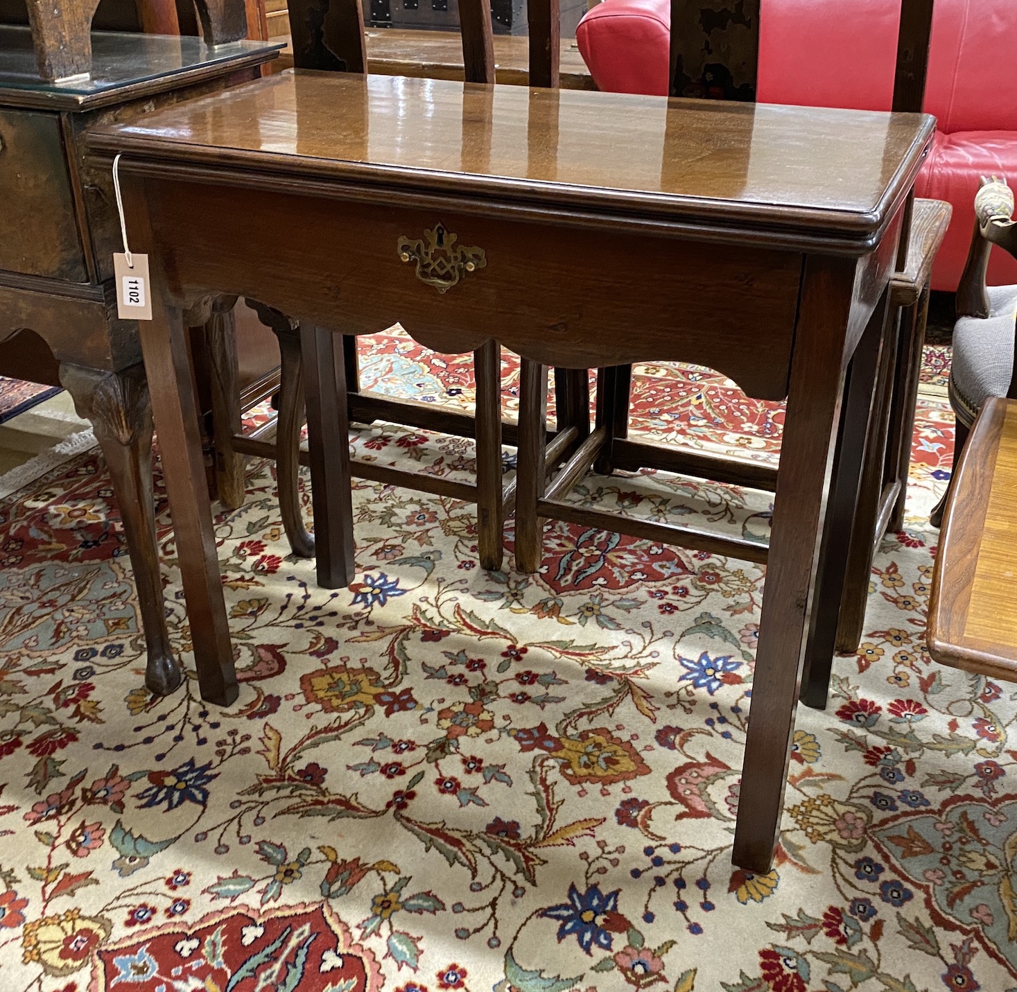 A George III rectangular mahogany folding tea table, width 80cm, depth 40cm, height 74cm